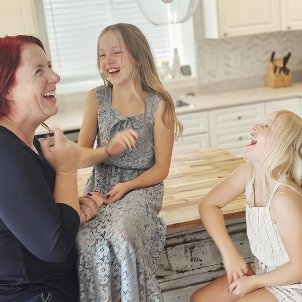 Crystal Donak, owner of Kaper Kids, with her kids